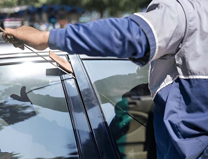 Technician using non‑damaging lockout tools